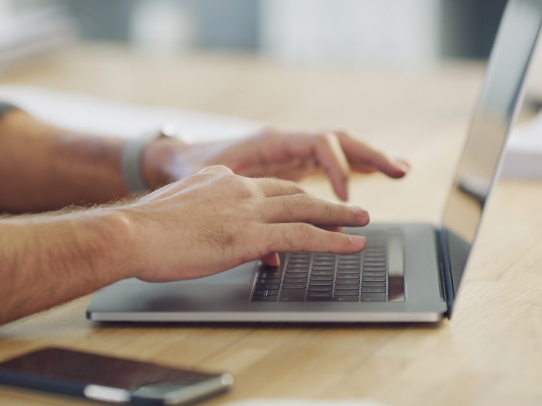 Laptop,,Business,And,Hands,Typing,In,Office,For,Email,,Report